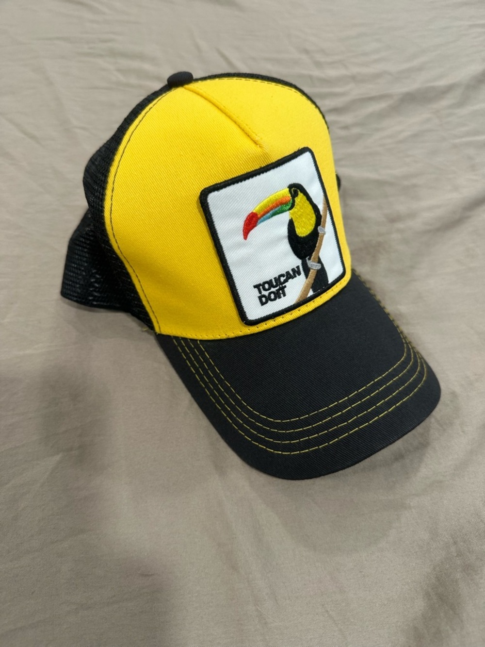 Toucan Do It Yellow & Black Trucker Hat